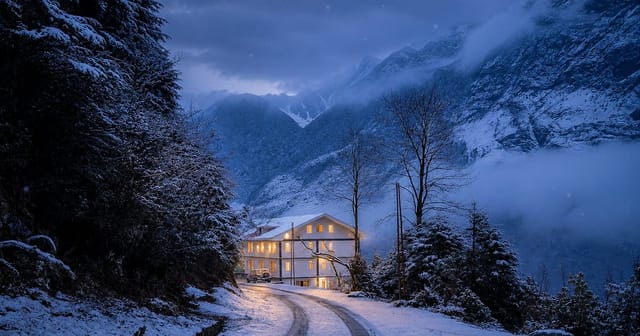 Warm lights at blue hour across snow-covered Lachung in North Sikkim